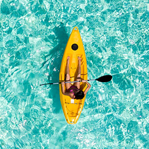 Woman in a yellow kayak